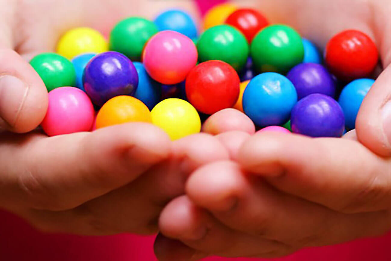 different coloured balls showing variety of hotels and importance of benchmarking