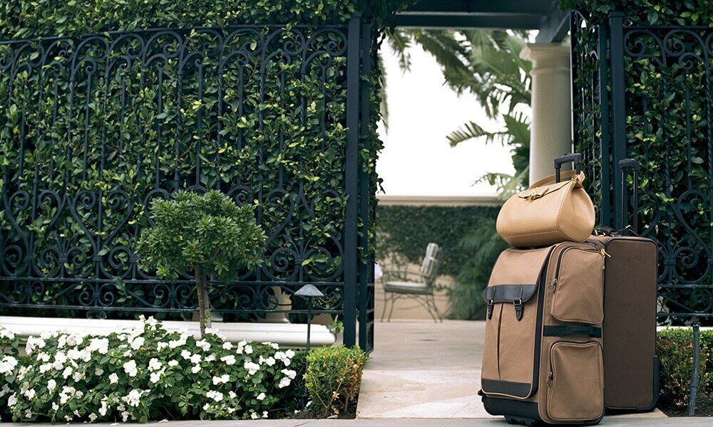 luggage near entrance of resort hotel