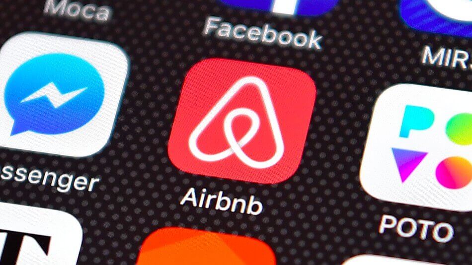 airbnb app logo on mobile phone