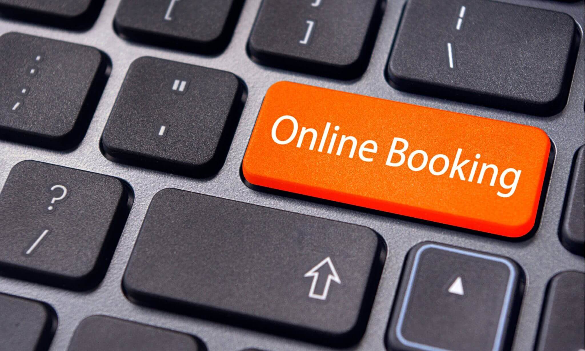 online booking key on keyboard reflecting importance of direct bookings for hotels
