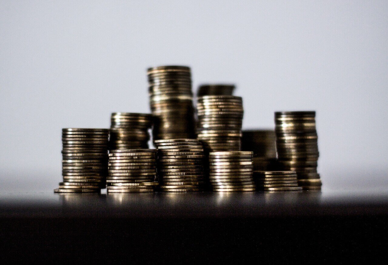 stacks of coins reflecting the impact of the wrong hotel room price strategy