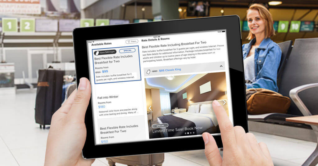 traveller looking at a hotel website on a tablet or ipad