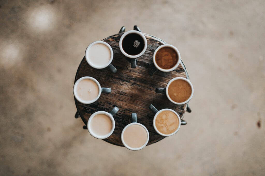 8 different cups of coffee representing different types of data