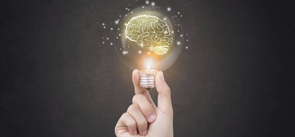 lightbulb with image of a brain inside reflecting hotels digital marketing and revenue trends