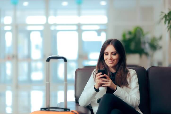 lady check-in at hotel using mobile