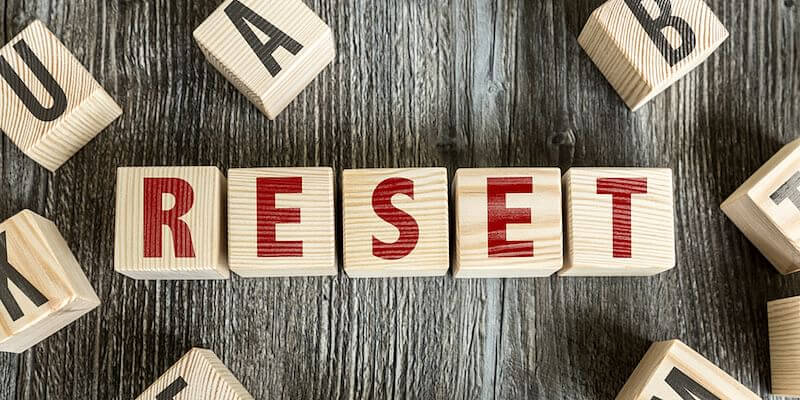 wooden blocks spelling out the word reset for the hospitality industry