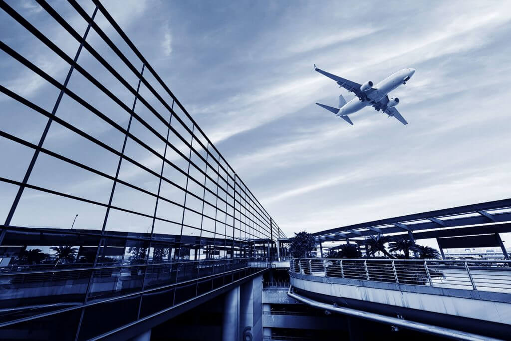 plane flying as people look to travel post lockdown