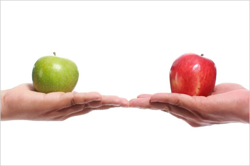 two apples of different colours showing how local hotels need to differentiate online