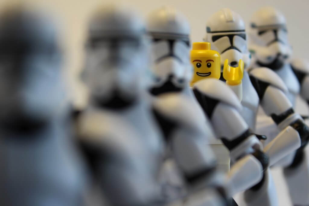 yellow lego piece amongst stormtrooper lego pieces showing impact of personalisation