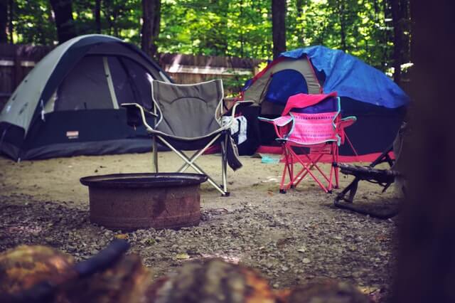 two tents pitched at a campsite where revenue management can be applied