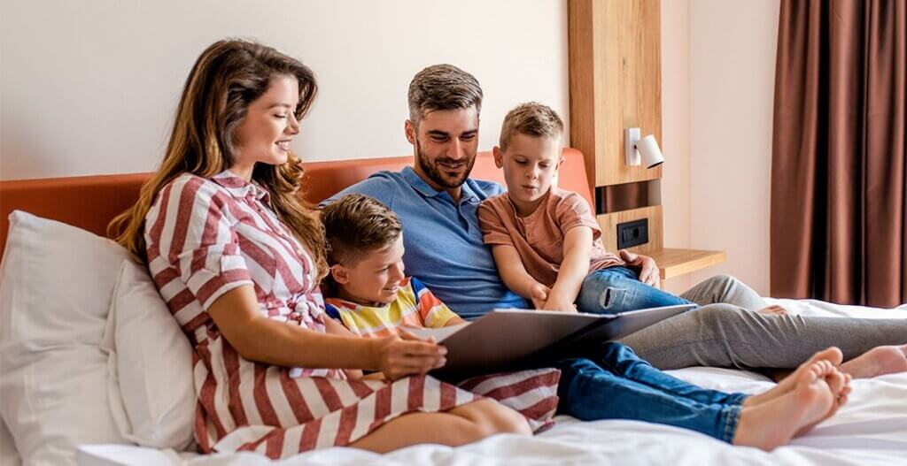 family in a hotel room