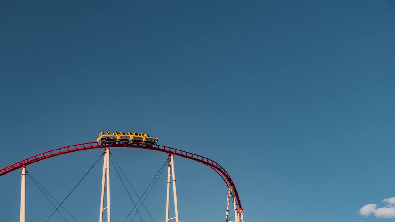 a roller coaster reflecting the ups and downs in booking patterns and how the shoulder season is a good time to drive bookings without the competitive frenzy of peak time