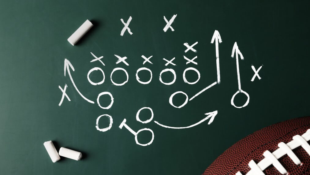 american football game play reflecting the blueprint a hotel marketer must develop for a unified commercial strategy