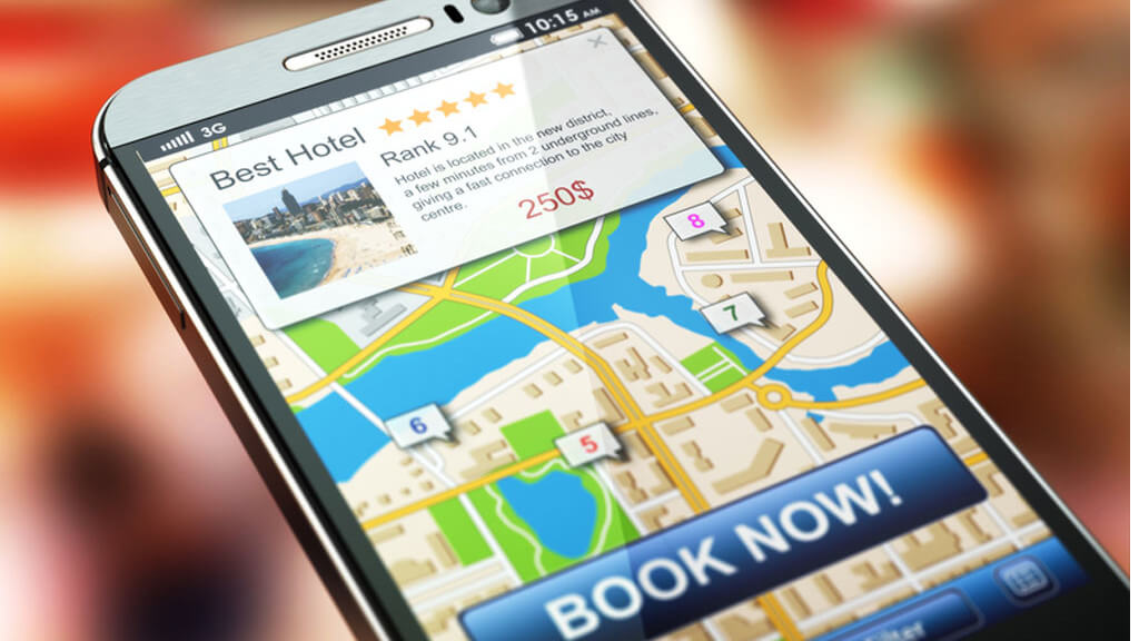 book now on a mobile phone reflecting the importance of booking apps to independent hotels