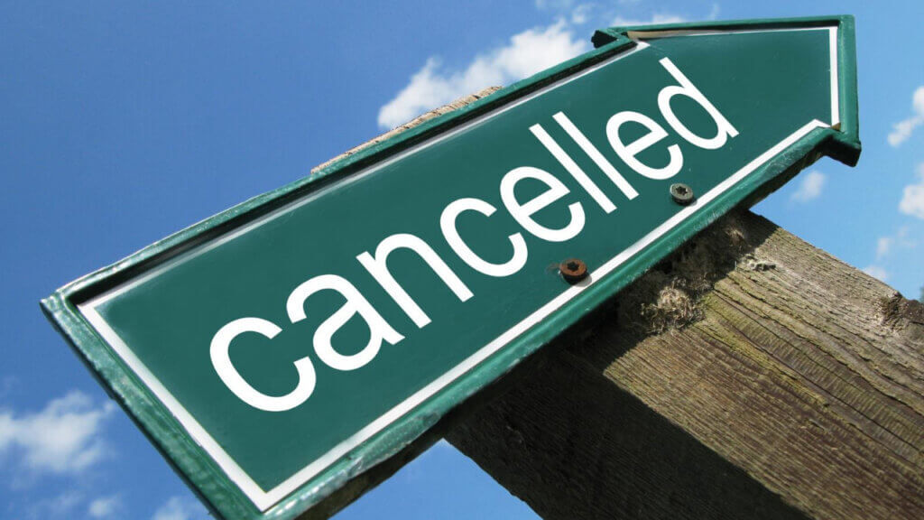 sign saying cancelled reflecting impact to profits of booking cancellations on hotels