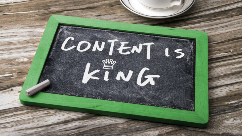 content is king handwritten in chalk reflecting importance of content marketing to independent hotels