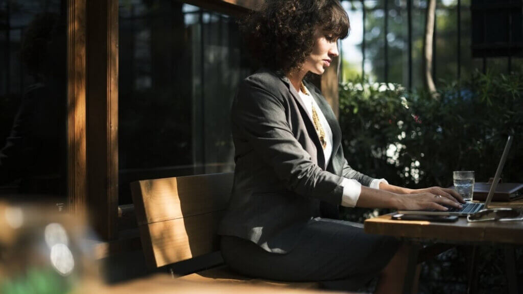 lady working in a hotel lobby as industry looks to maximize every square foot