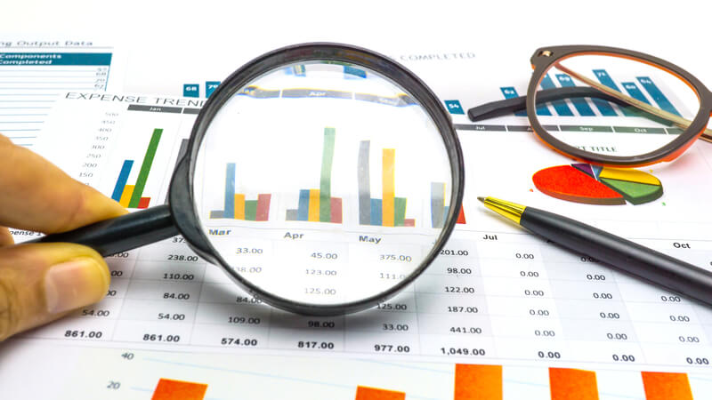 looking at graphs through a magnifying glass asking how can a revenue manager become a revenue sleuth