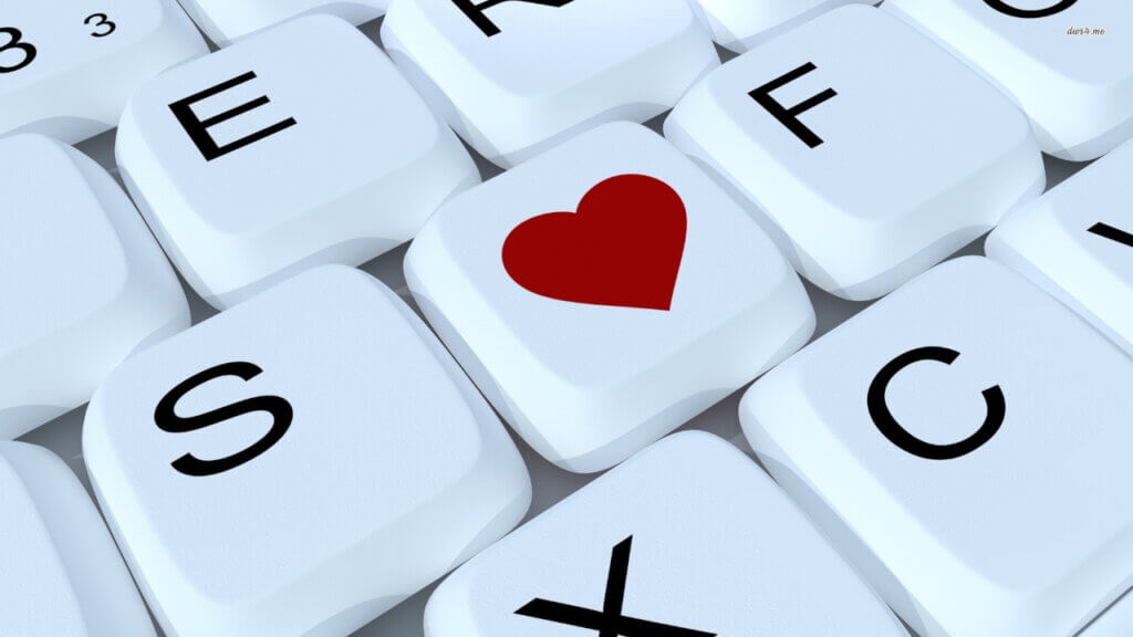 a heart on a keyboard reflecting importance to hotels of reviews for their digital marketing strategies