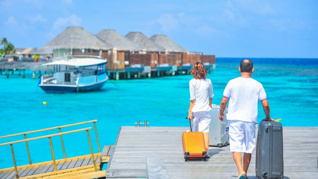 2 hotels guests arriving on a dock for a boat transfer to a holiday resort reflecting the importance of the growing need for a personalised guest experience