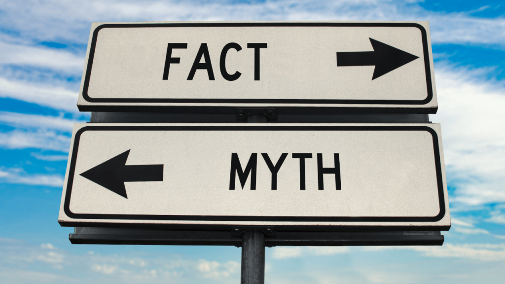 sign post saying fact or myth reflecting 5 myths about ai pricing and how they are costing hotels revenue