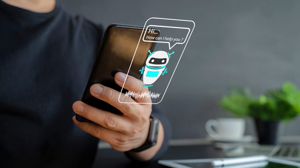 man on phone engaging with a chatbot illustrating the ai advantages for hotels who embrace chatbots to increase revenue and boost communication