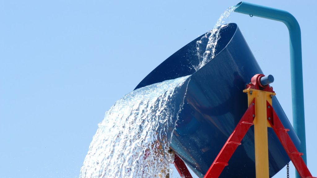 bucket with lots of water pouring out the bottom reflecting why mastering flow thru is key to hotel profit maximization