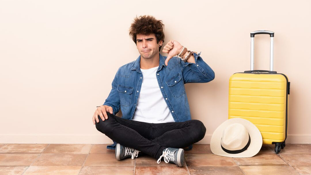 bookboost article image of person with a thumbs down reflecting poor guest loyalty and 5 reasons why hotel guests are not returning