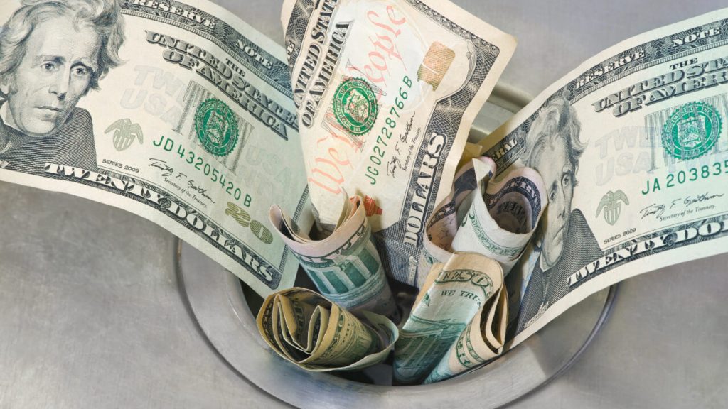 money down the drain reflecting real cost of a bad review