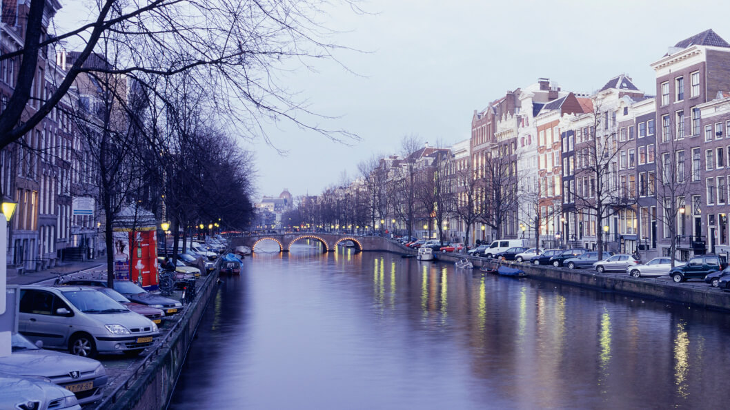 typical Netherlands river scene and how their hotel sector will need to navigate the 2026 VAT increase