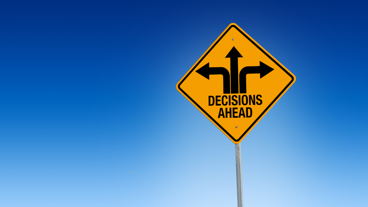 road sign with the word decision reflecting the change ai is bringing to the hotel industry and choices hoteliers will need to make